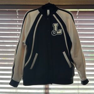 Lululemon athletica Black and Cream Varsity Jacket. Barely worn.